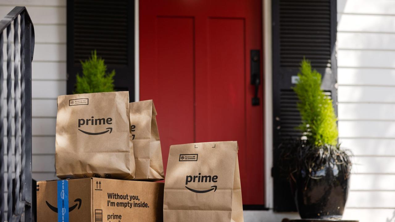 Amazon Prime delivery bags on a doorstep